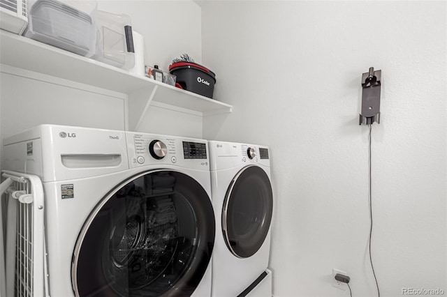 15774 W Girard Ave, Morrison, CO 80465 - laundry area with washing machine and clothes dryer and laundry area