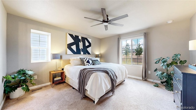 1933 Villageview Ln, Castle Rock, CO 80104 - bedroom with light carpet, baseboards, and a ceiling fan