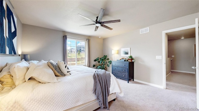 1933 Villageview Ln, Castle Rock, CO 80104 - bedroom with baseboards, light colored carpet, and a ceiling fan