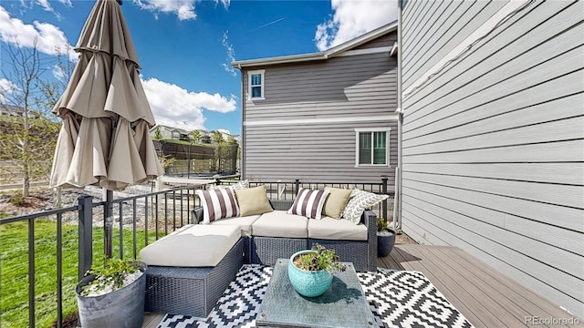 1933 Villageview Ln, Castle Rock, CO 80104 - wooden deck with outdoor lounge area and a trampoline