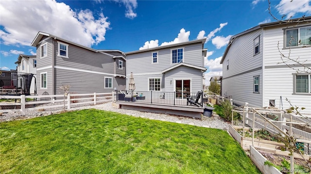 1933 Villageview Ln, Castle Rock, CO 80104 - back of property with a vegetable garden and a deck