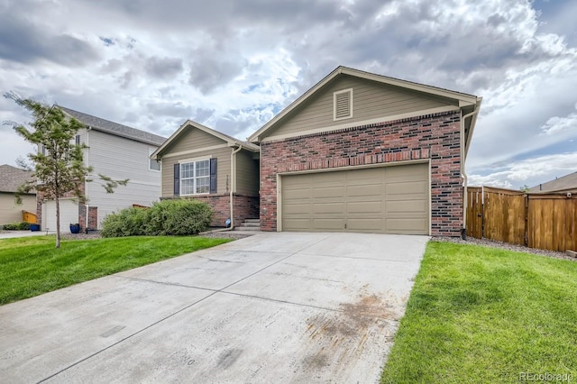 ranch-style house featuring an attached garage, brick siding, fence, driveway, and a front lawn