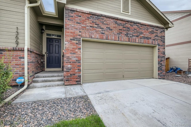 garage featuring driveway