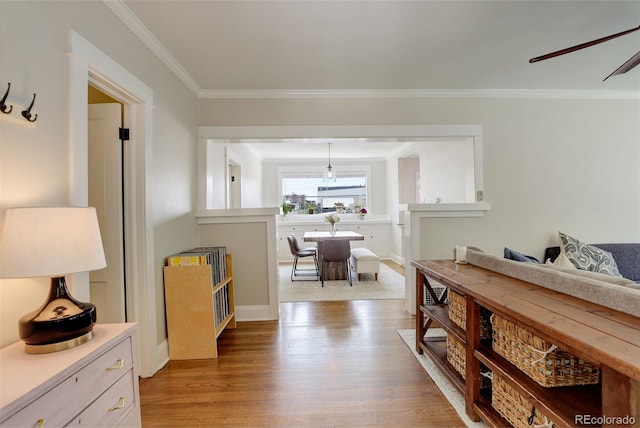 848 Harrison St, Denver, CO 80206 - hallway featuring wood finished floors, ornamental molding, and baseboards