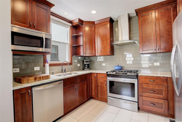 848 Harrison St, Denver, CO 80206 - kitchen featuring stainless steel appliances, wall chimney range hood, a sink, decorative backsplash, and light stone counters