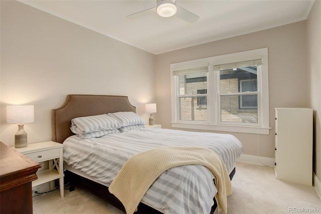 848 Harrison St, Denver, CO 80206 - bedroom with light colored carpet, crown molding, ceiling fan, and baseboards