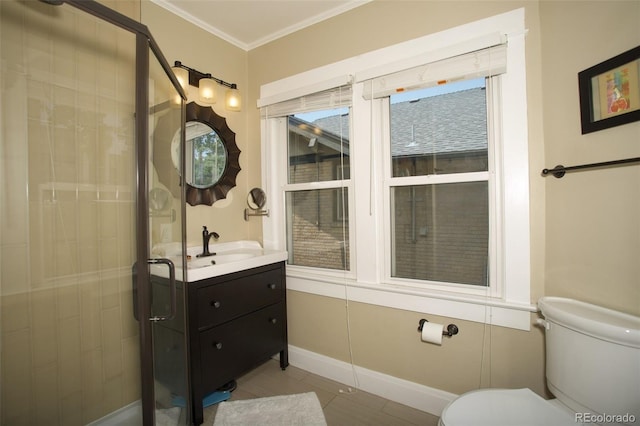 848 Harrison St, Denver, CO 80206 - full bathroom featuring toilet, vanity, tile patterned flooring, baseboards, and crown molding