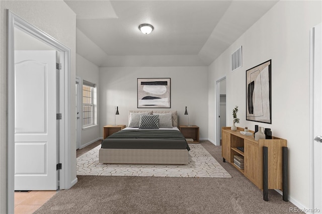 10578 E Jewell Ave, Aurora, CO 80012 - bedroom with light carpet and baseboards