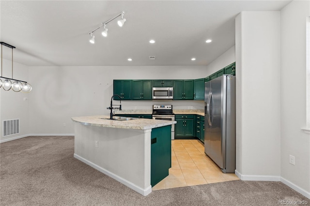 10578 E Jewell Ave, Aurora, CO 80012 - kitchen featuring stainless steel appliances, green cabinets, a sink, light colored carpet, and light countertops