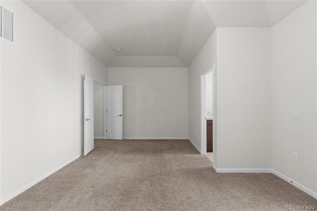 10578 E Jewell Ave, Aurora, CO 80012 - carpeted empty room with vaulted ceiling and baseboards
