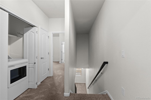 10578 E Jewell Ave, Aurora, CO 80012 - hall featuring an upstairs landing, washer / clothes dryer, carpet flooring, and baseboards