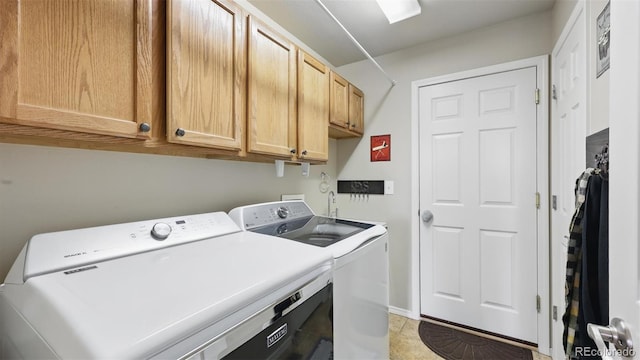 11818 Rio Secco Rd, Peyton, CO 80831 - washroom with separate washer and dryer, cabinet space, and baseboards