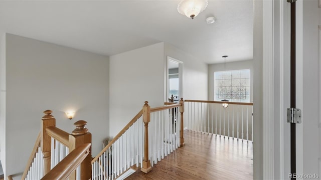 11818 Rio Secco Rd, Peyton, CO 80831 - corridor featuring an upstairs landing and wood finished floors