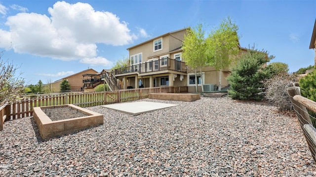11818 Rio Secco Rd, Peyton, CO 80831 - fenced backyard featuring a patio, a vegetable garden, central AC, and a residential view