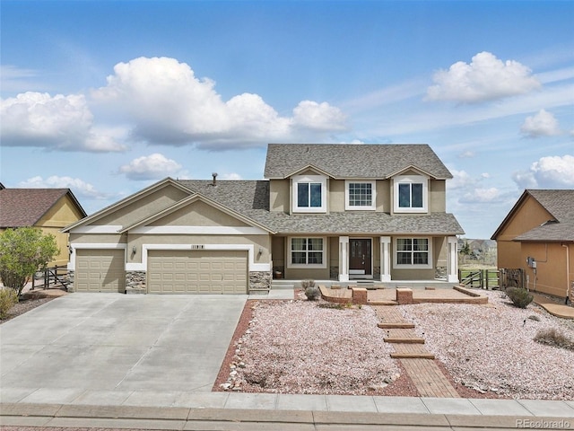 11818 Rio Secco Rd, Peyton, CO 80831 - view of front of home featuring stucco siding, an attached garage, concrete driveway, a porch, and a shingled roof