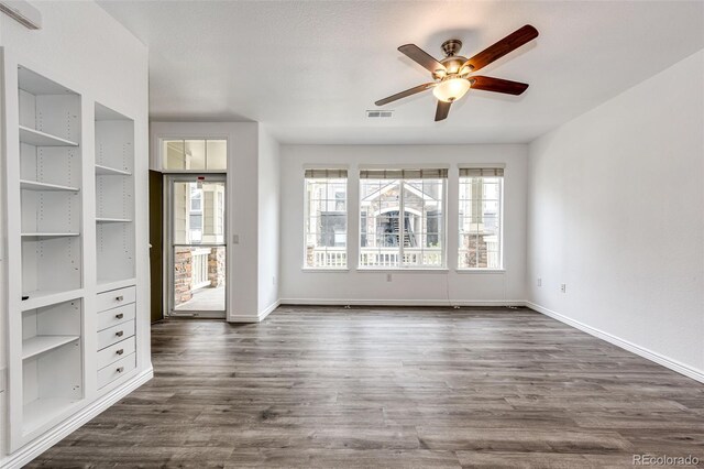 15955 E Geddes Dr Unit 55, Aurora, CO 80016 - unfurnished living room featuring a ceiling fan, baseboards, and dark wood finished floors