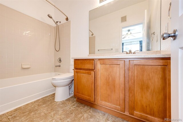 15955 E Geddes Dr Unit 55, Aurora, CO 80016 - bathroom featuring tub / shower combination, vanity, toilet, and tile patterned floors