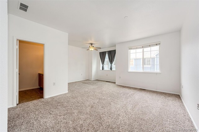 15955 E Geddes Dr Unit 55, Aurora, CO 80016 - spare room with carpet floors, a ceiling fan, and baseboards