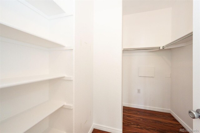 15955 E Geddes Dr Unit 55, Aurora, CO 80016 - walk in closet featuring dark wood-type flooring