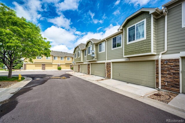 15955 E Geddes Dr Unit 55, Aurora, CO 80016 - view of asphalt road with a residential view