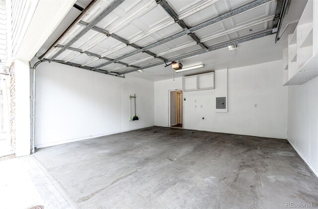 15955 E Geddes Dr Unit 55, Aurora, CO 80016 - garage with electric panel and a garage door opener