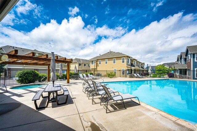 15955 E Geddes Dr Unit 55, Aurora, CO 80016 - community pool featuring a residential view, a patio area, and a pergola