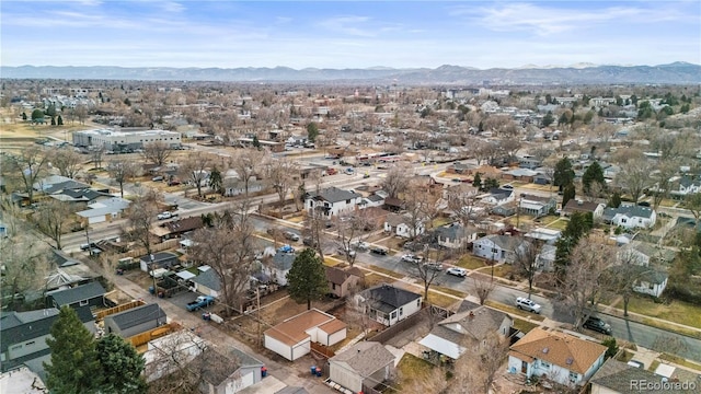 birds eye view of property with a mountain view and a residential view