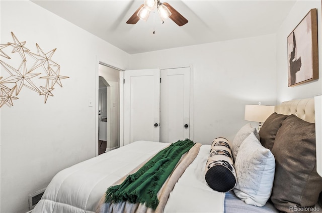 bedroom with visible vents and ceiling fan