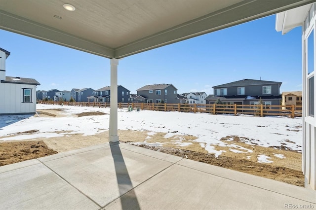 view of snow covered patio