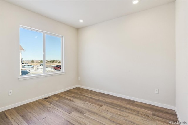 empty room featuring light hardwood / wood-style floors