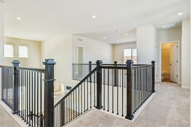 interior space featuring light colored carpet