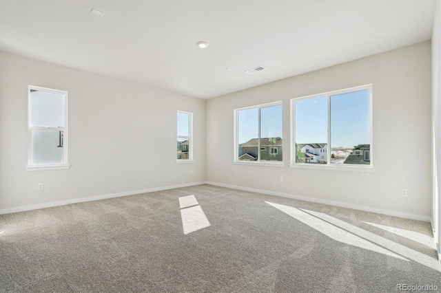 unfurnished room featuring carpet floors