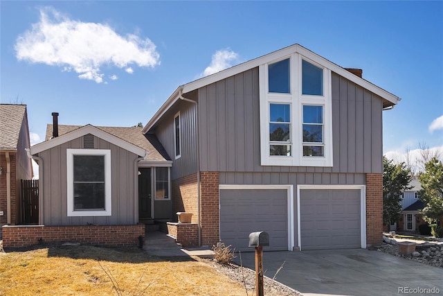 view of front of property with driveway, a garage, board and batten siding, and brick siding