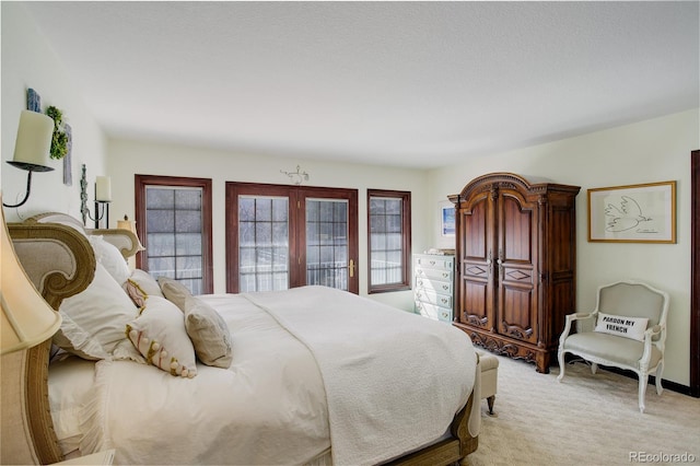 bedroom featuring light carpet