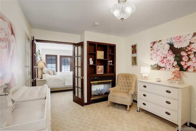 bedroom with light colored carpet