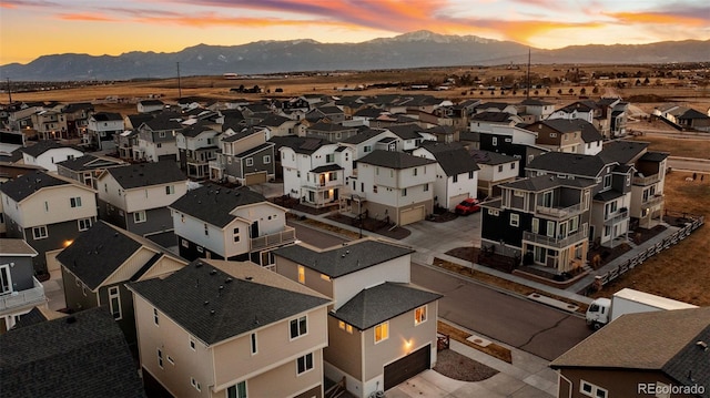 aerial view with a mountain view and a residential view