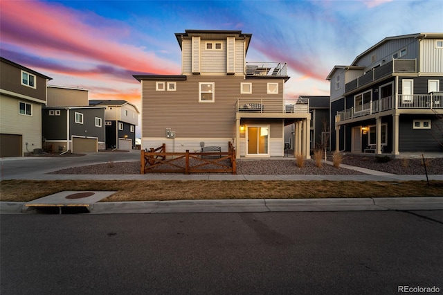 view of front of property featuring driveway and a garage