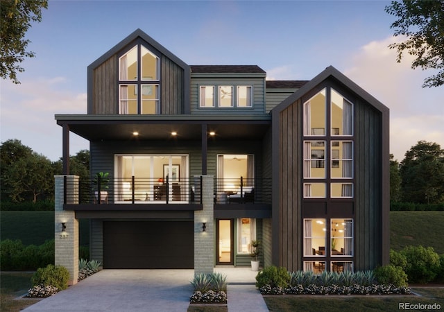 contemporary house with a balcony and a garage