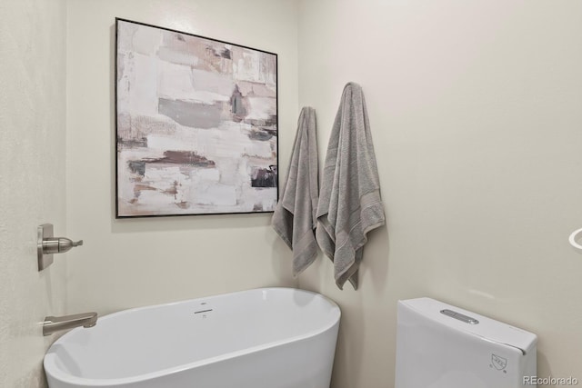 full bathroom with a freestanding bath