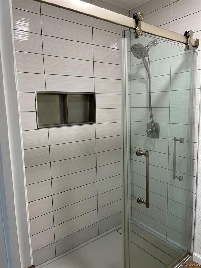 bathroom featuring a stall shower