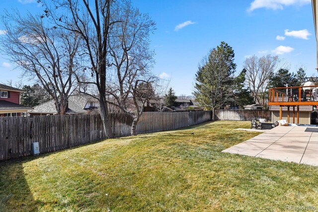 view of yard featuring a patio and a fenced backyard