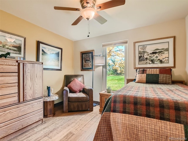 bedroom featuring light wood-style floors and ceiling fan