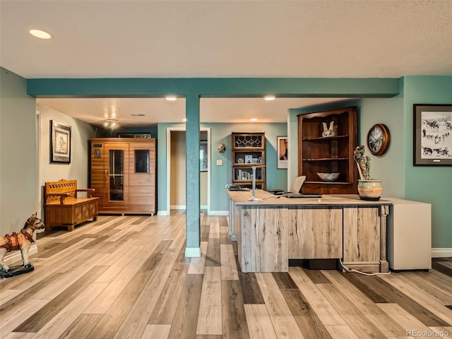 bar featuring baseboards, wood finished floors, and recessed lighting