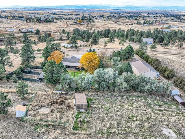 drone / aerial view featuring a mountain view