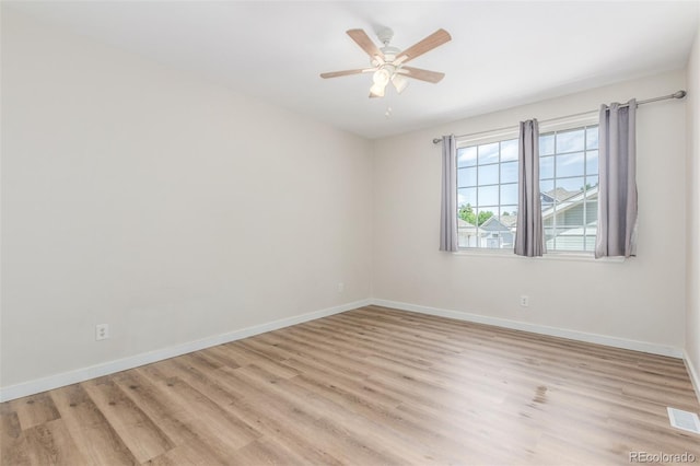 12931 Lafayette St Unit G, Thornton, CO 80241 - unfurnished room featuring light wood-type flooring and a ceiling fan