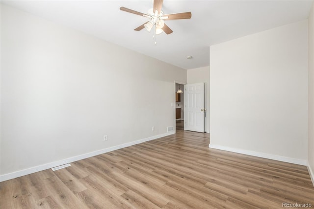 12931 Lafayette St Unit G, Thornton, CO 80241 - spare room featuring ceiling fan and light wood-style flooring