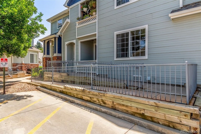 12931 Lafayette St Unit G, Thornton, CO 80241 - property entrance featuring a patio and uncovered parking