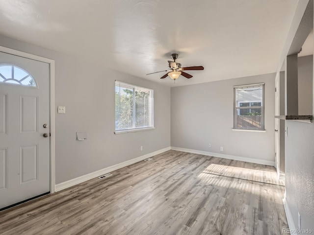 1731 Uinta St, Denver, CO 80220 - foyer entrance featuring light wood-type flooring and a ceiling fan