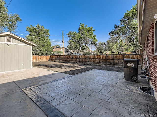 1731 Uinta St, Denver, CO 80220 - fenced backyard with a patio