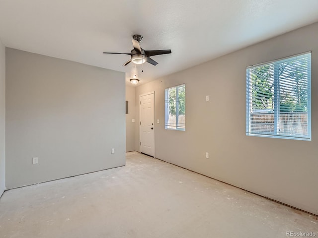 1731 Uinta St, Denver, CO 80220 - unfurnished room featuring a ceiling fan and concrete floors